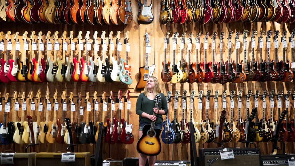 Kids go to Guitar Center Kids World School